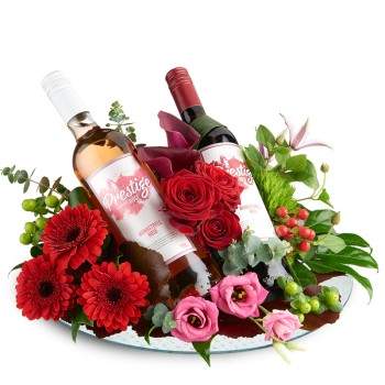 Bloemstuk met rode en rosé prestige wijn
