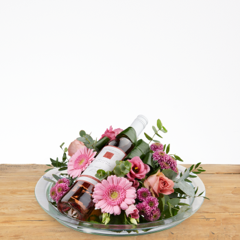Bloemstuk roze met wijn