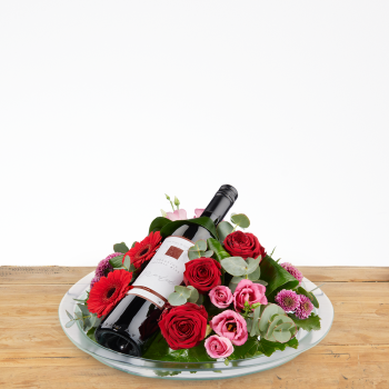 Bloemstuk rood met wijn