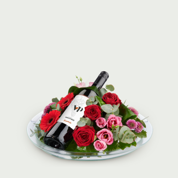 Flower arrangement red with wine