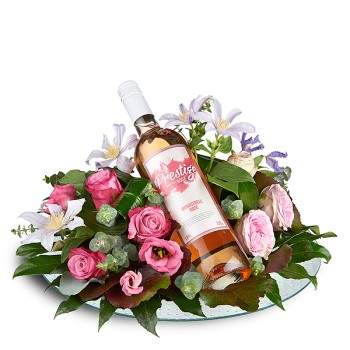 Bloemstuk met rose wijn